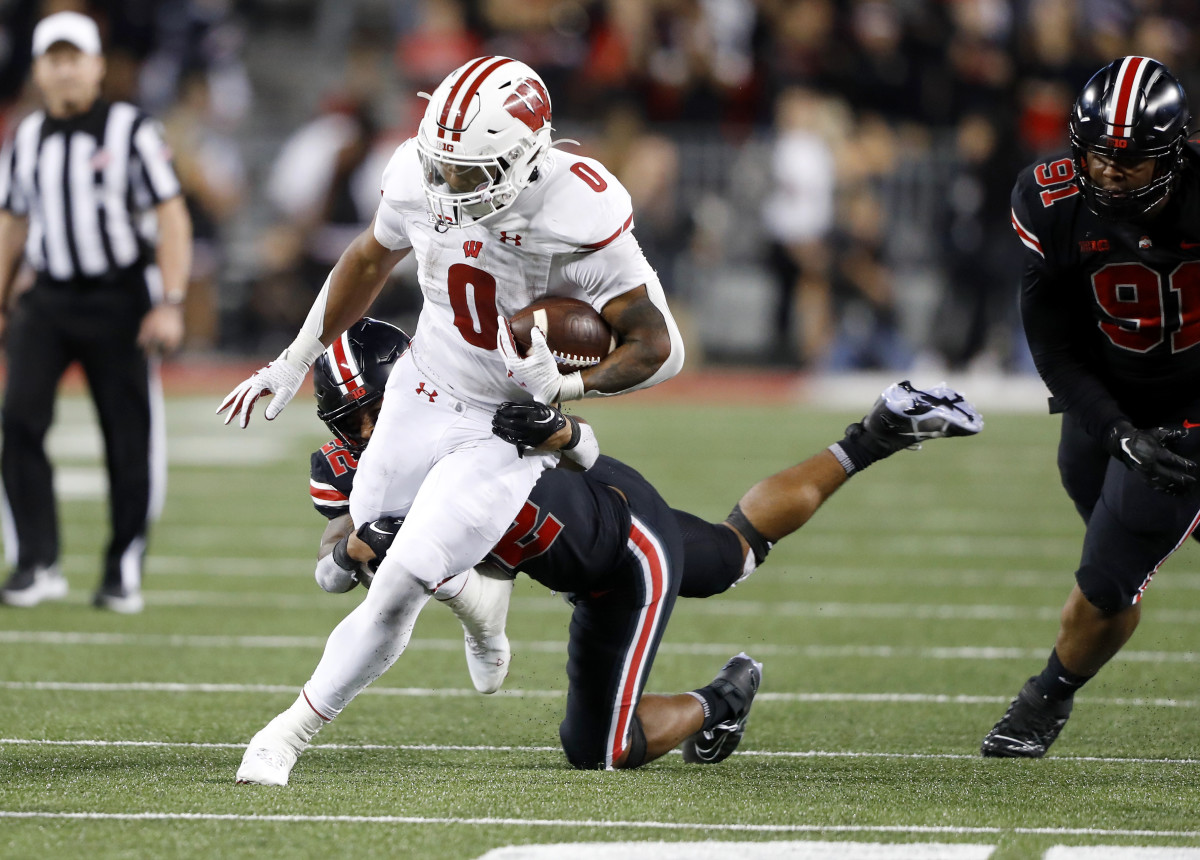 Sep 24, 2022; Columbus, Ohio, USA; Wisconsin Badgers running back Braelon Allen (0) runs the ball during the third quarter against the Ohio State Buckeyes at Ohio Stadium. Mandatory Credit: Joseph Maiorana-USA TODAY Sports